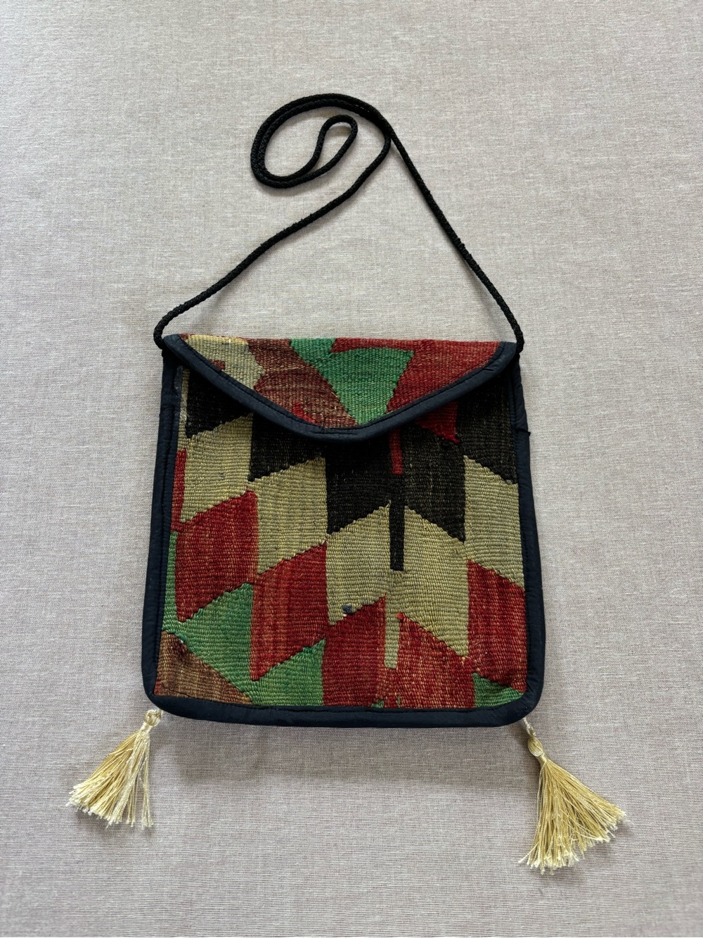Vintage woven tassel carpet purse.